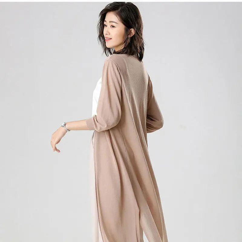 New Mid-length Knitted Cardigan Sunscreen Clothes for Women 7-quarter Sleeve Hollow Loose Air Conditioning Shirt Jacket
