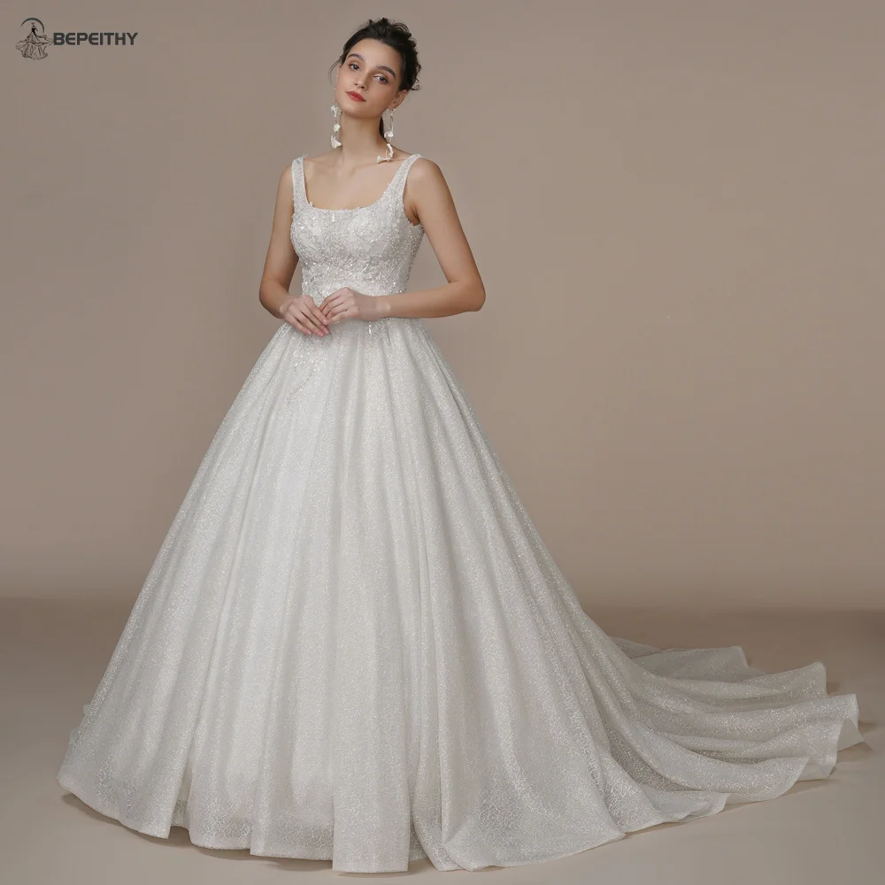 

BEPEITHY Exquisite Glitter A Line Wedding Dresses Sleeveless Court Train Princess Sexy Open Back Modern Bride Ivory Bridal Gown