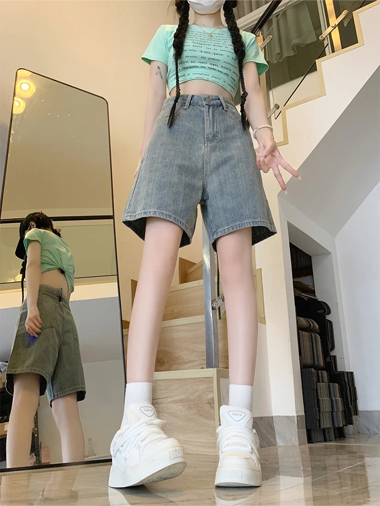 กางเกงยีนส์ขาตรงทรงหลวมเอวสูงลายทางสีอ่อนสไตล์วินเทจสำหรับผู้หญิงใส่หน้าร้อน