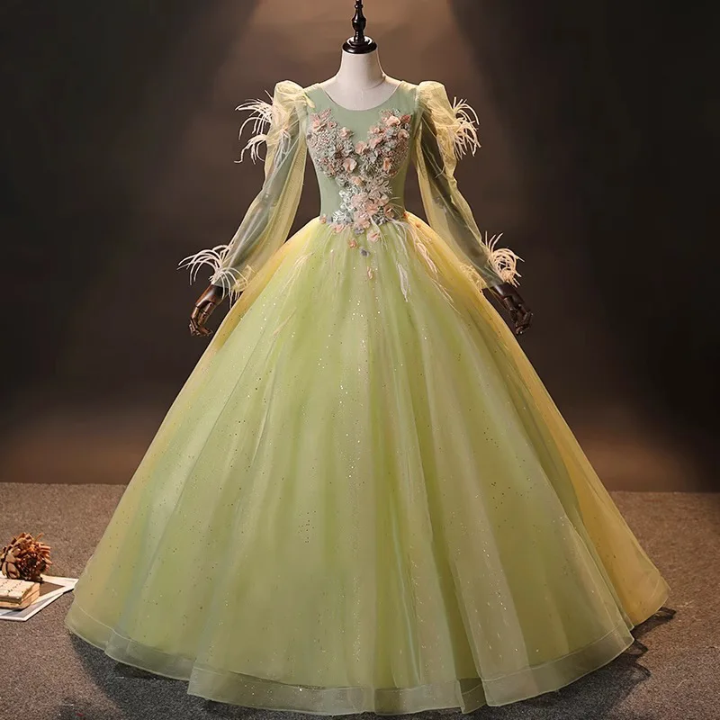 Luxury Light Green Quinceanera Dress with Feathers Long Sleeves Beaded 3D Flower Applique Princess Floor Length Formal Ball Gown