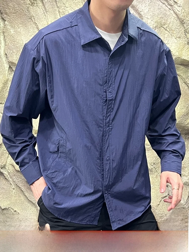 

Легкое дышащее водонепроницаемое кожаное тюневое молодежное модное летнее тонкое пальто UPF50 со сложенной текстурой Busin Adstrative