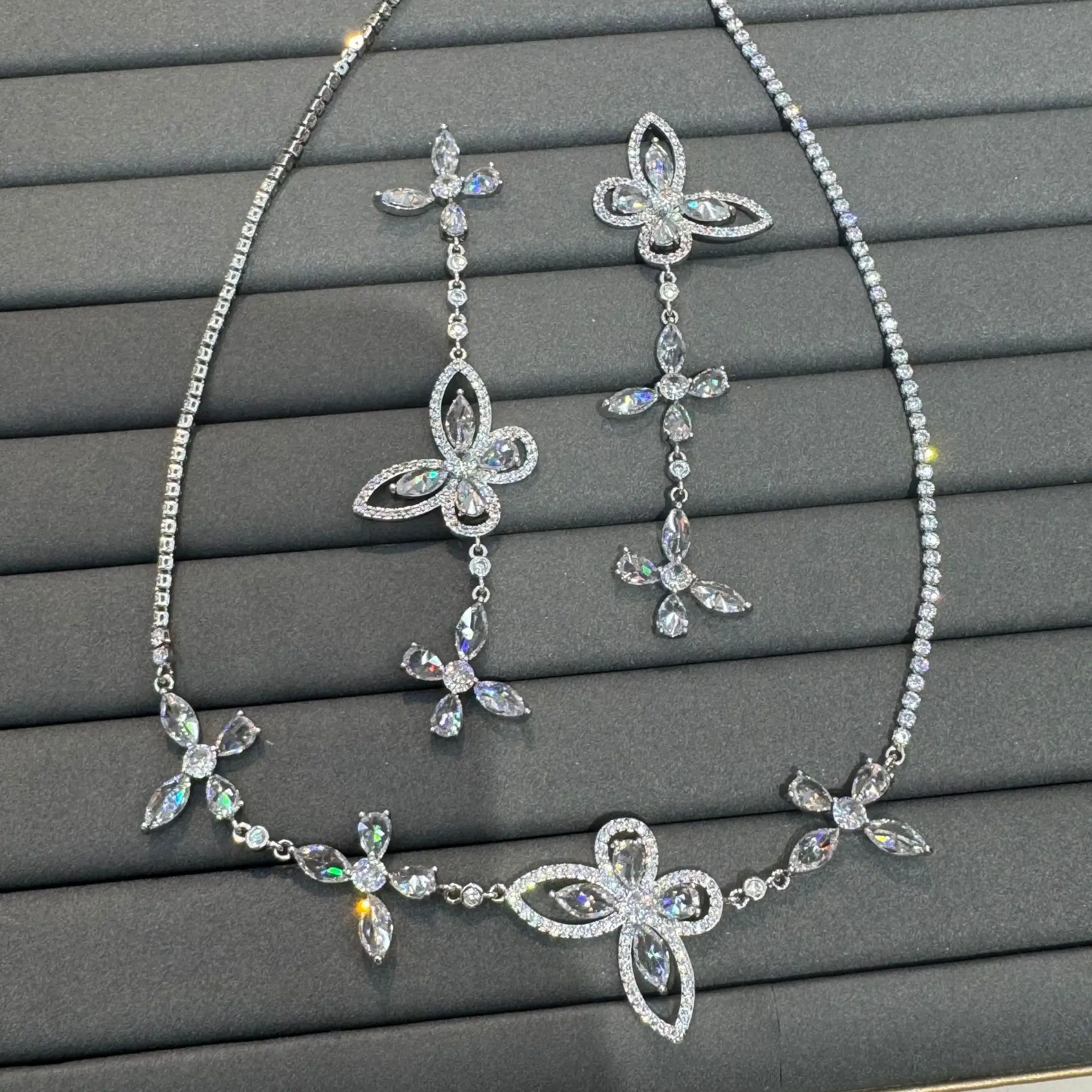 

Asymmetrical Bow Zircon Elegant Earrings and Necklace Set