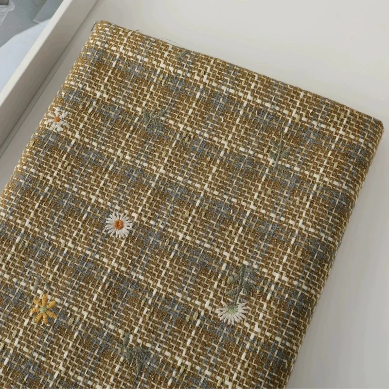Cotton blend with checkered daisy embroidery and gold thread blended fabric for autumn and winter coat and dress.