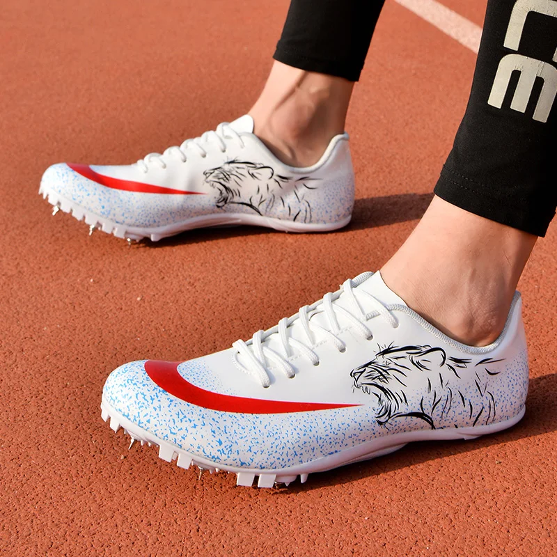 Man Track Spike Profesjonalne buty Lekkoatletyczne buty sportowe dla mężczyzn Kobiety Outdoor Kobiety Siłownia Trampki do biegania Czarny Biały