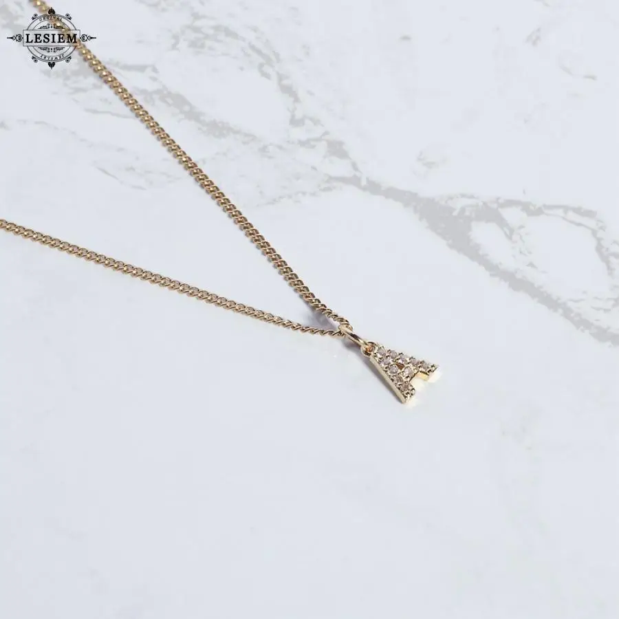 תליון זהב חם חדש מצופה זהב נקבה 26 אות נחושת דו-חלד עם אביזרים שרשרת צד נירוסטה תכשיטים