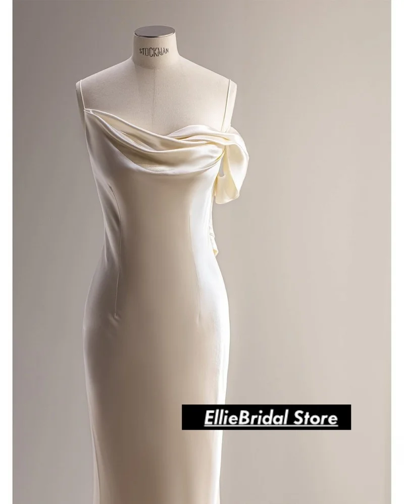 エレガントな白いサテンのストラップレスのイブニングドレス、アフリカの女の子のためのロングバックレスマーメイドプロムドレス、ベスティド・デ・ガラ2025、カスタマイズ可能