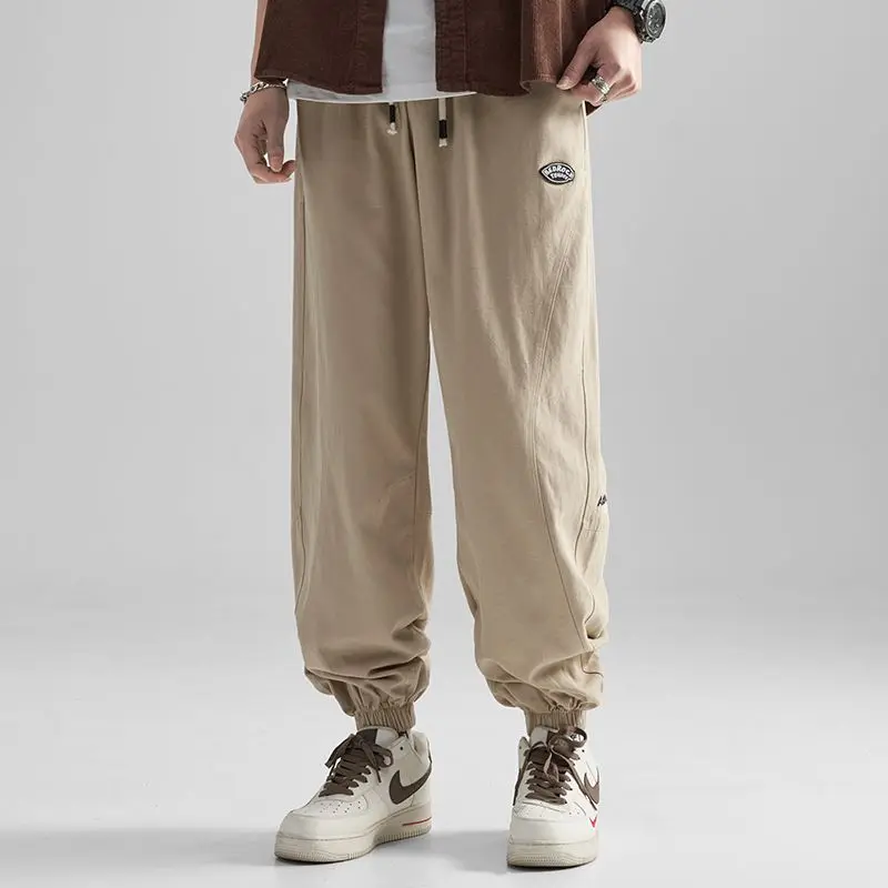 Pantalones Cargo de algodón para hombre, pantalón holgado de Color sólido con bolsillos y cordón en la cintura, informal, a la moda