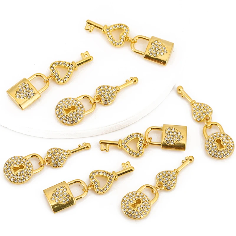 

2 комплекта из нержавеющей стали, инкрустированный цирконом, блестящий замок для ключей, подвеска для женщин, серьги «сделай сам», ожерелье, роскошные ювелирные изделия, кулон, аксессуары