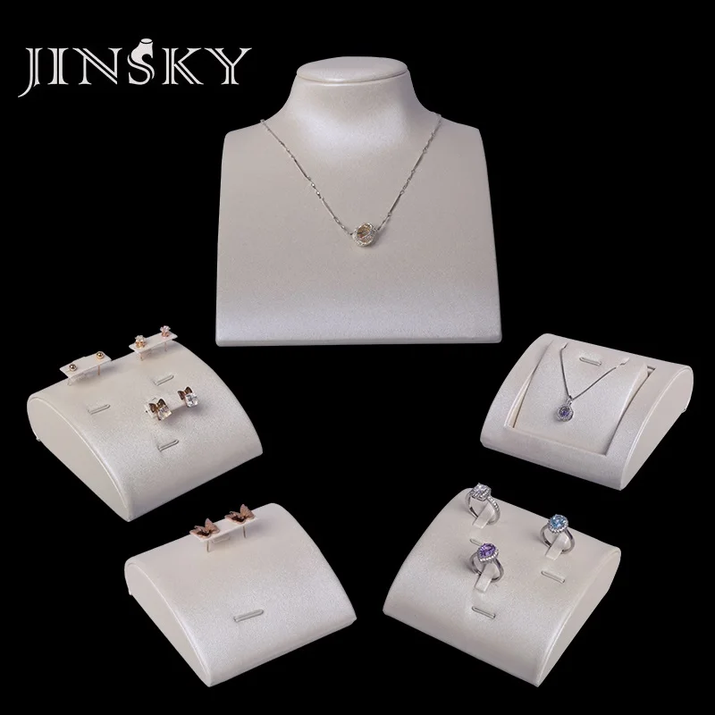 Jinsky ชุดชั้นวางเครื่องประดับหนังสีขาวหรูหราพร้อมไม้ด้านในเครื่องประดับชุดชั้นวางขายปลีก