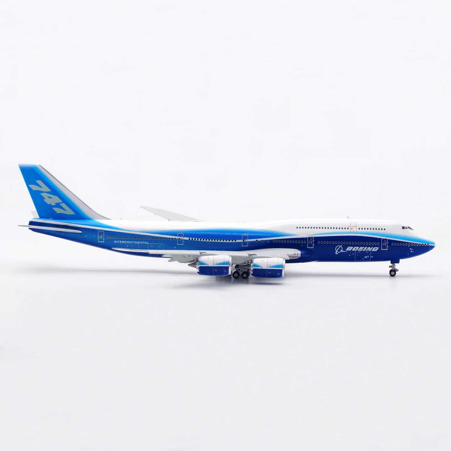 B631001F سبيكة تحصيل طائرة هدية HX نموذج 1:400 بوينغ B747-8 "لون المنزل" دييكاست نموذج طائرة رفرف أسفل مع حامل