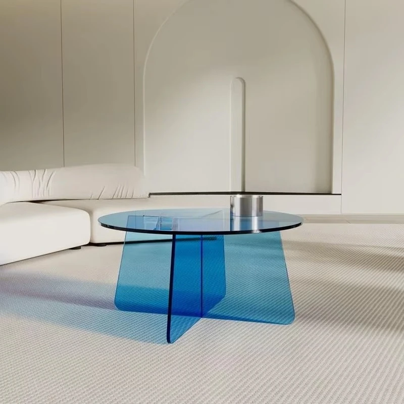 The luxurious-style plastic coffee table features a minimalist acrylic design, sturdy and durable, suitable for living room