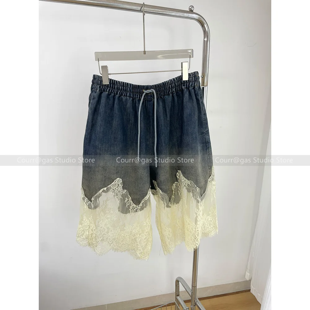 Niche fashion new irregular burnt flowers eyelash lace splicing elastic high waist denim shorts female