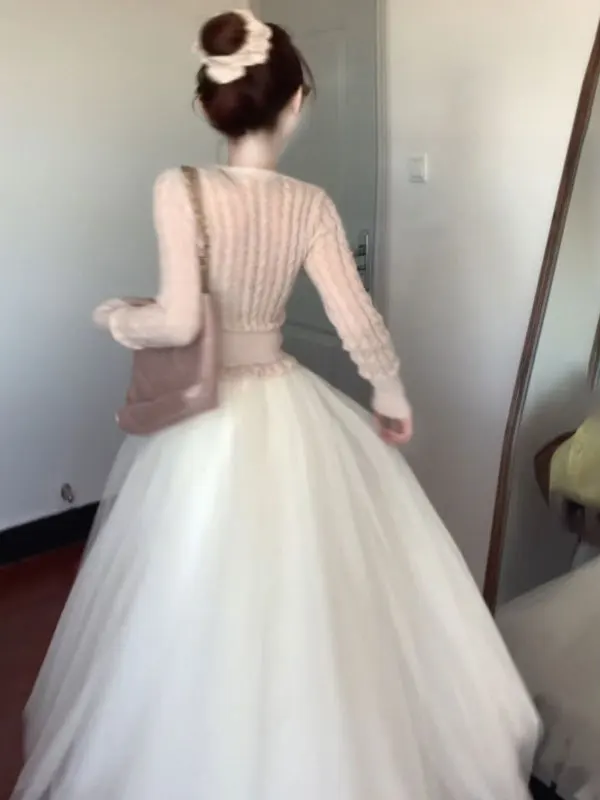 

Зимний модный комплект 2025: мягкий вязаный топ и юбка-миди, удобный, с завышенной талией, длинный рукав, с узлом...