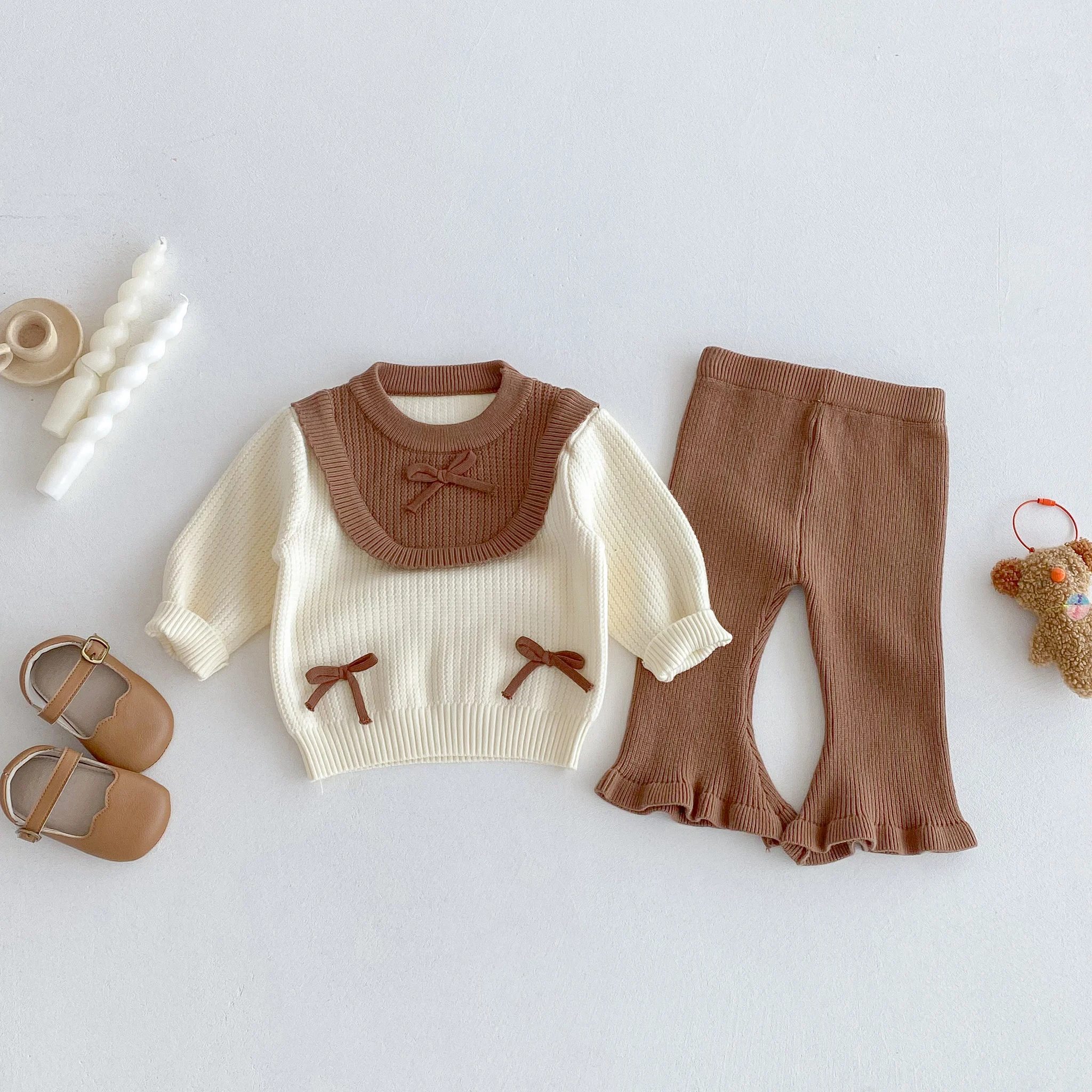 A Cute Two-Piece Set of Stylish Bow Round-Neck Top and Flared Pants for baby Girls in Autumn and Winter 2025