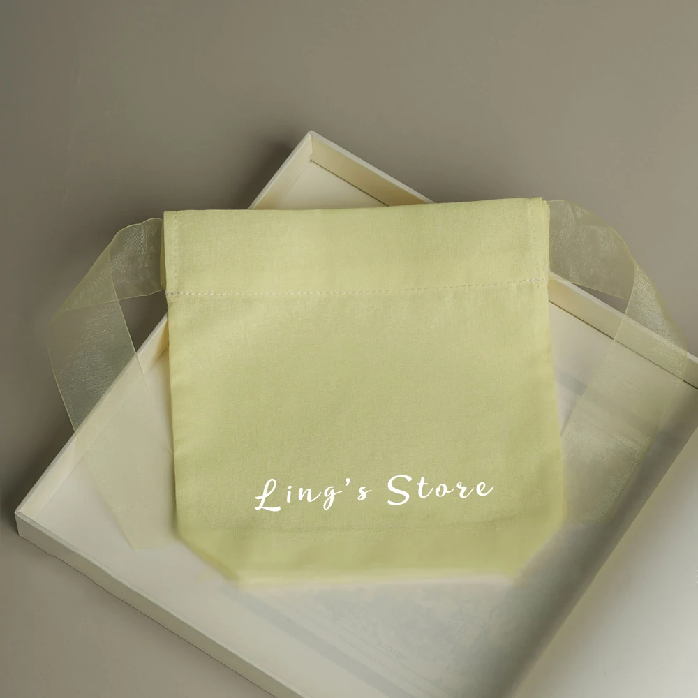 

100 шт., роскошные персонализированные ювелирные изделия с логотипом, хлопковая сумка на шнурке из органзы, лента, часы для духов, очки, упаковочная сумка, холст, карман