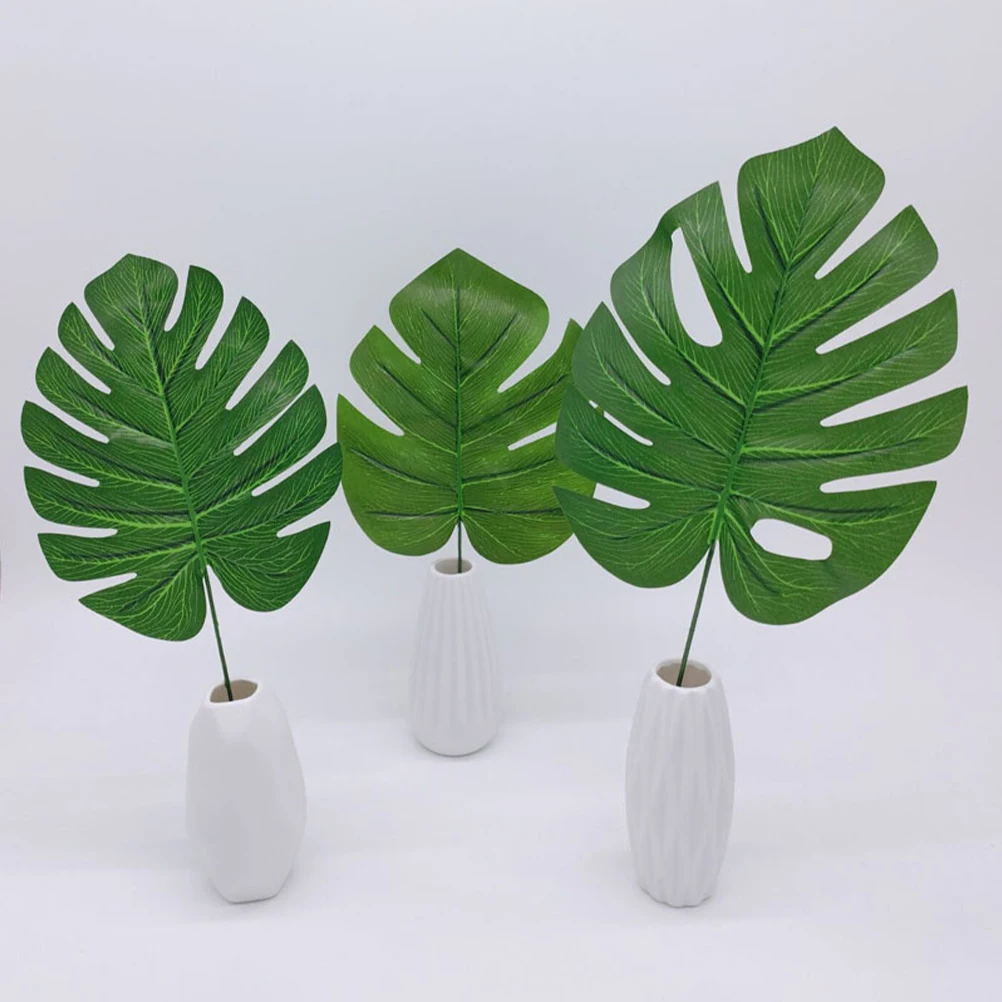 

12pcs Realistic Artificial Monstera Leaves Faux Greenery Tropical Fake Stems Dust Resistant Easy Maintenance Home Office