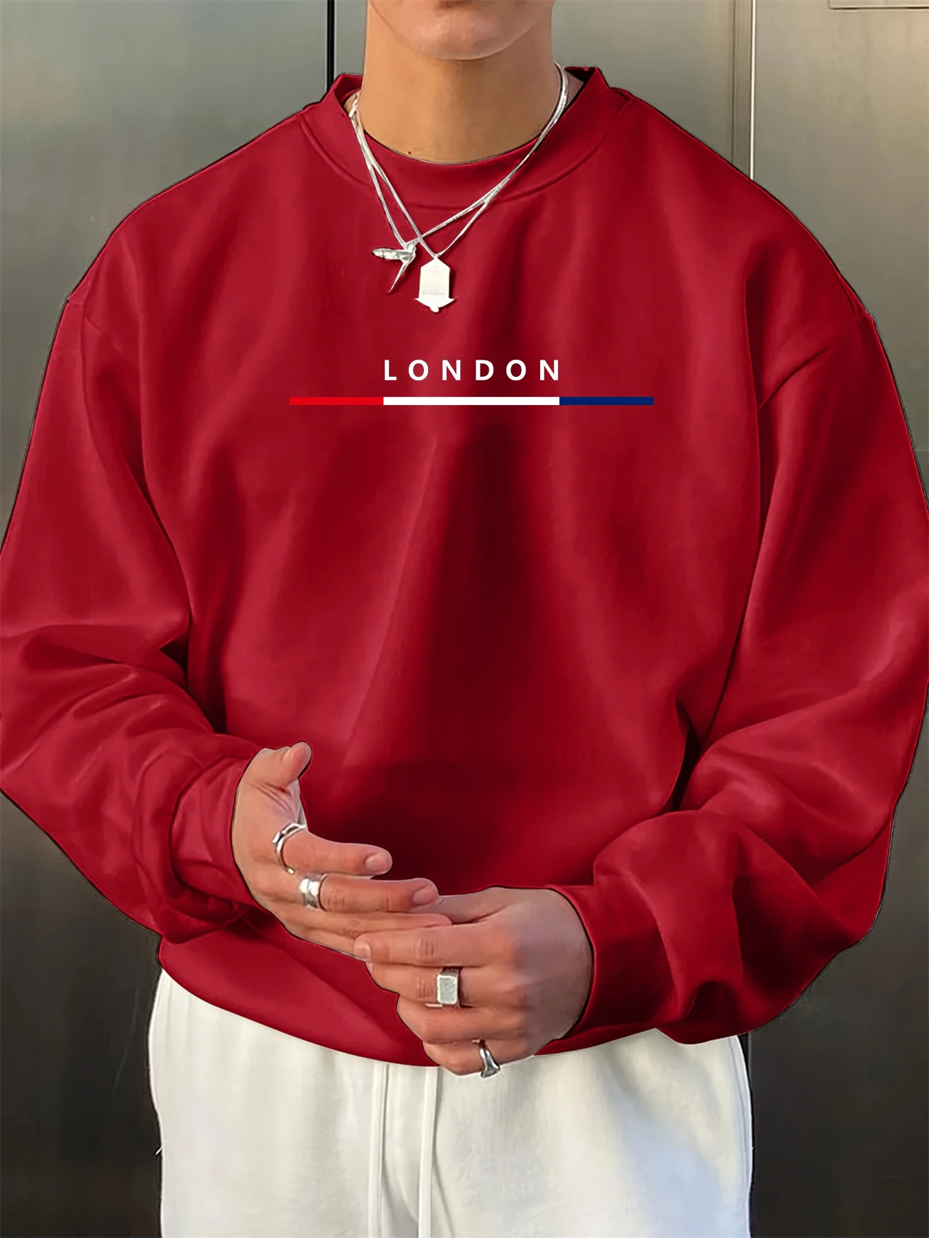 سترة رجالية عصرية للخريف والشتاء فضفاضة بنمط حروف لندن مطبوعة بأكمام طويلة ورقبة دائرية