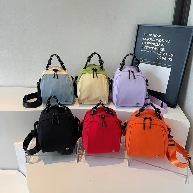 2026 New Women's Backpack Fashion High Quality Nylon Commuter Storage Small Bag Solid Color Versatile Girl Handheld Shoulder Bag