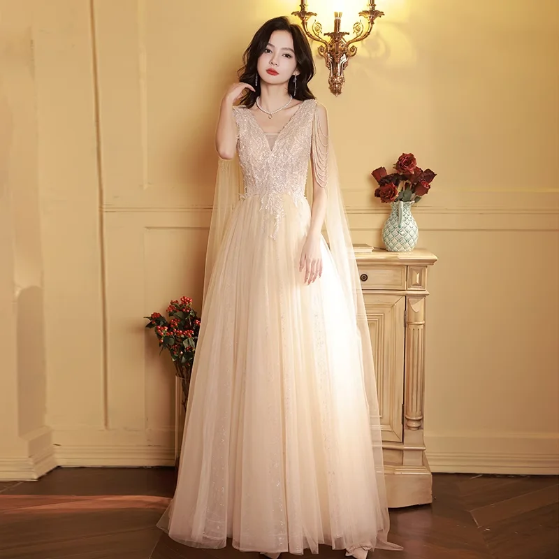 Evening dress for women, V-neck, annual meeting host, champagne color, high-grade sense of fairy air, shoulder tassel, vocal art