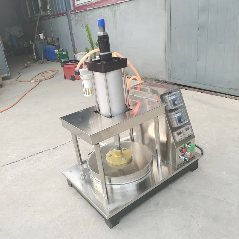 เครื่องทำแพนเค้กเครื่องขึ้นรูปเค้กแบบบางเครื่องรีดแป้งที่อบขนมข้าวสาลีแบบวงกลมเครื่องอัดความร้อน Tortilla roti