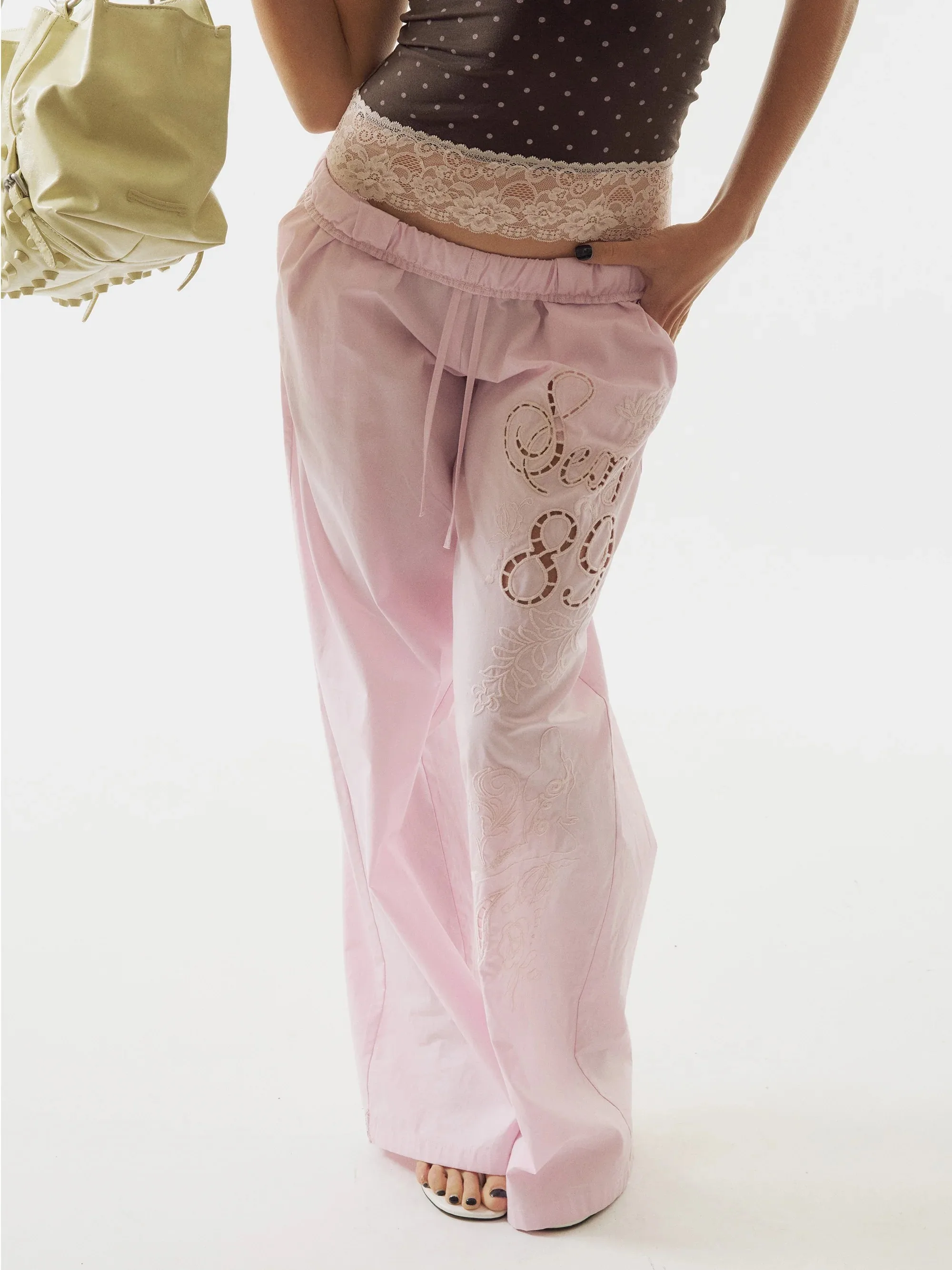 2026 fashion new Clean fit women's trousers hollow three-dimensional embroidery design solid color simple daily casual fashion.