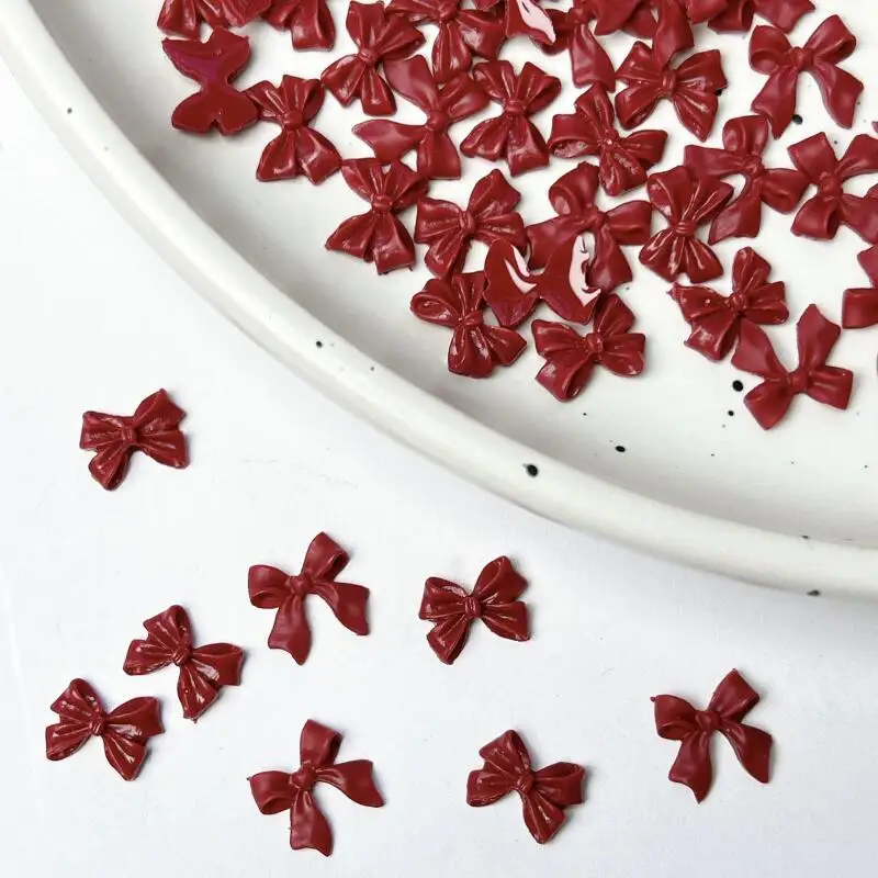 100 pçs clássico vinho vermelho fita bowknots decorações da arte do prego 3d minimalista gravata resina encantos do prego acessórios para diy peças de unhas