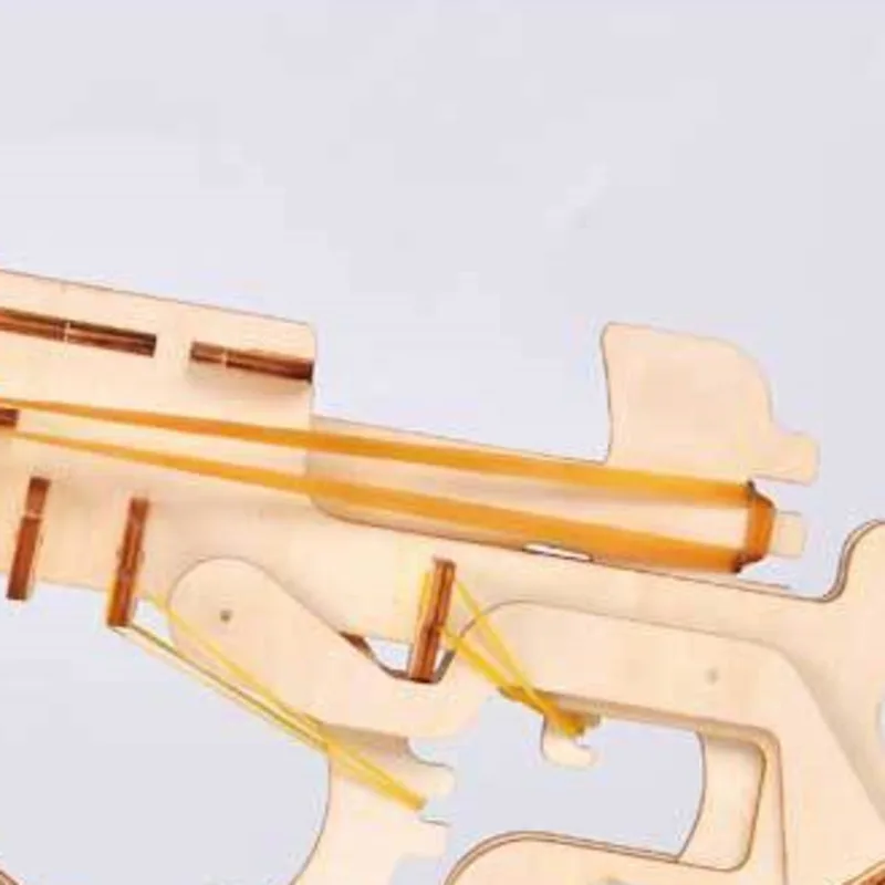 Pistole con elastico giocattoli Puzzle in legno 3D assemblaggio fai da te modello di pistola giocattoli educativi per arma da Ping Pong