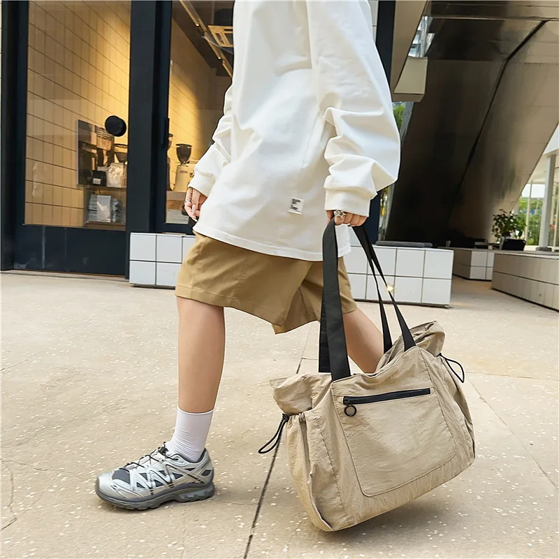 

Большая женская дорожная сумка 2025 года, многофункциональная нейлоновая сумка, водостойкая вещевая сумка с регулируемым ремешком для спортзала, плавания и путешествий