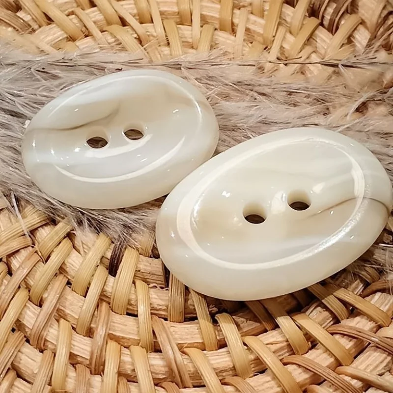 Resin irregular special-shaped buttons two-eye trench coat high-end coat coat woolen fashion buttons decorative buttons