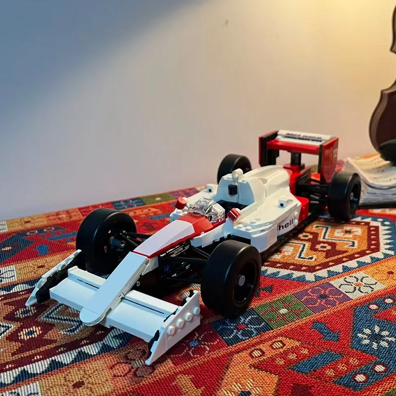 Heiße Angebote 693-teiliger MOC Sena Racing Mp4 Nigel Mansell Mechanische Gruppe Bausteine Kreative Steine Weihnachtsgeschenke für Erwachsene – Detail 1