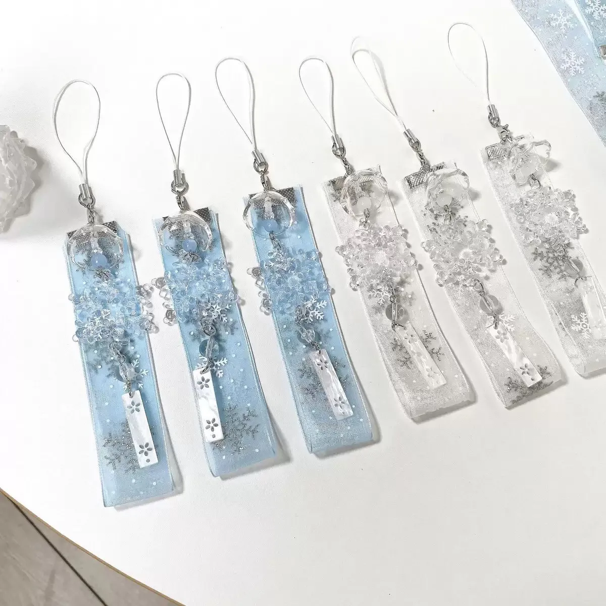 

1 Piece of Dreamy Snowflake Ribbon Phone Charm, Phone Accessory, Bell Charm Keychain, Christmas Bag Accessory, Water Drop Lace Wind Chime Phone Chain, Camera Bag Accessory