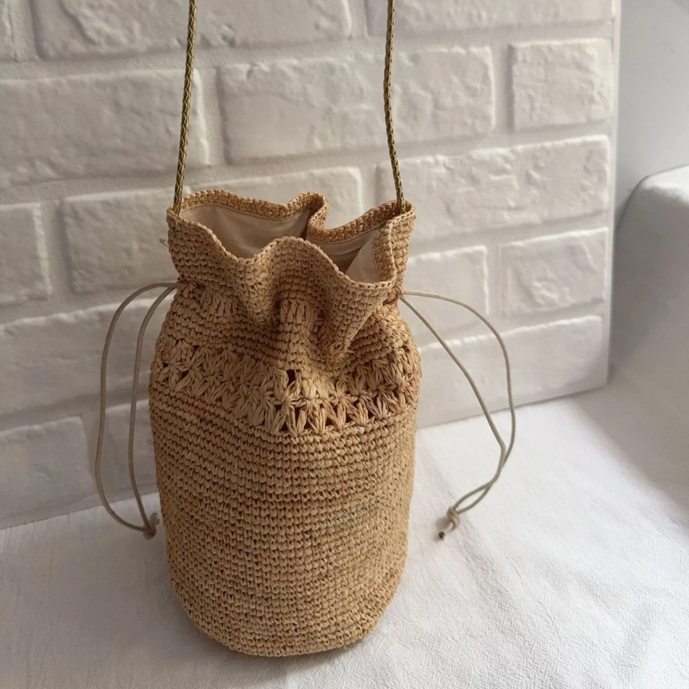 2026 NEW Mini Bucket Straw Bag Bohemian Raffia Shoulder Bag Hollow Woven Beach Bags for Women Natural Straw Drawstring Bags NEW