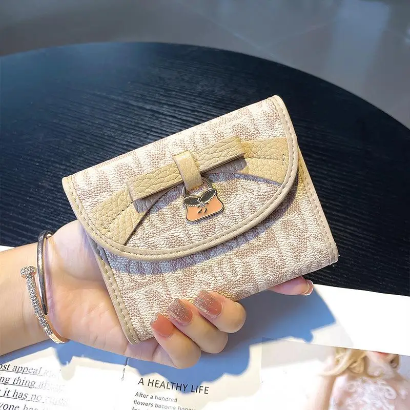 hong-kong-2026-nouveau-portefeuille-femme-court-en-cuir-veritable-design-simple-multi-emplacements-pour-cartes-compact-pliant