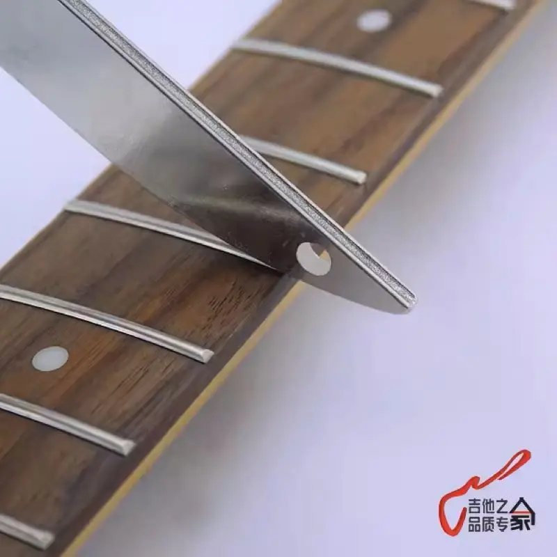 

Electric wood folk guitar, electric bass, fingerboard, sound quality, silk edges, corners, diamond grooves, files, curved knives