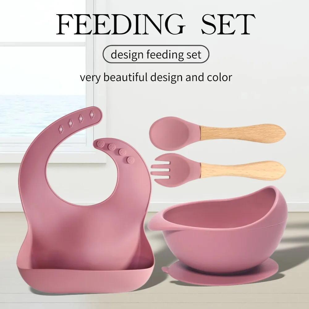 

Silicone baby feeding set silicone bib suction bowl with wooden handle fork and spoon set 4pcs silicone baby feeding set