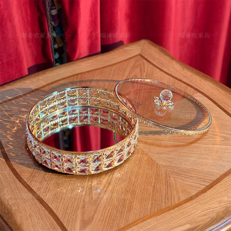 Light luxury crystal rotating fruit plate, glass storage box with lid, high-end snack candy plate in home living room, European