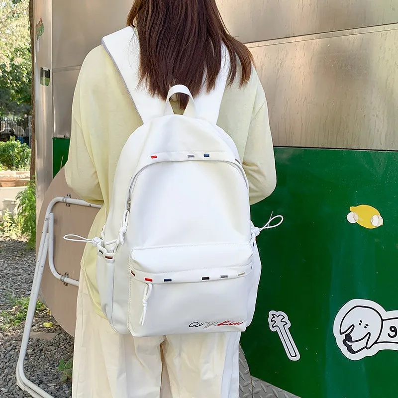 Korean-style cartoon backpack for female middle and high school students, stylish and large-capacity, versatile casual backpack