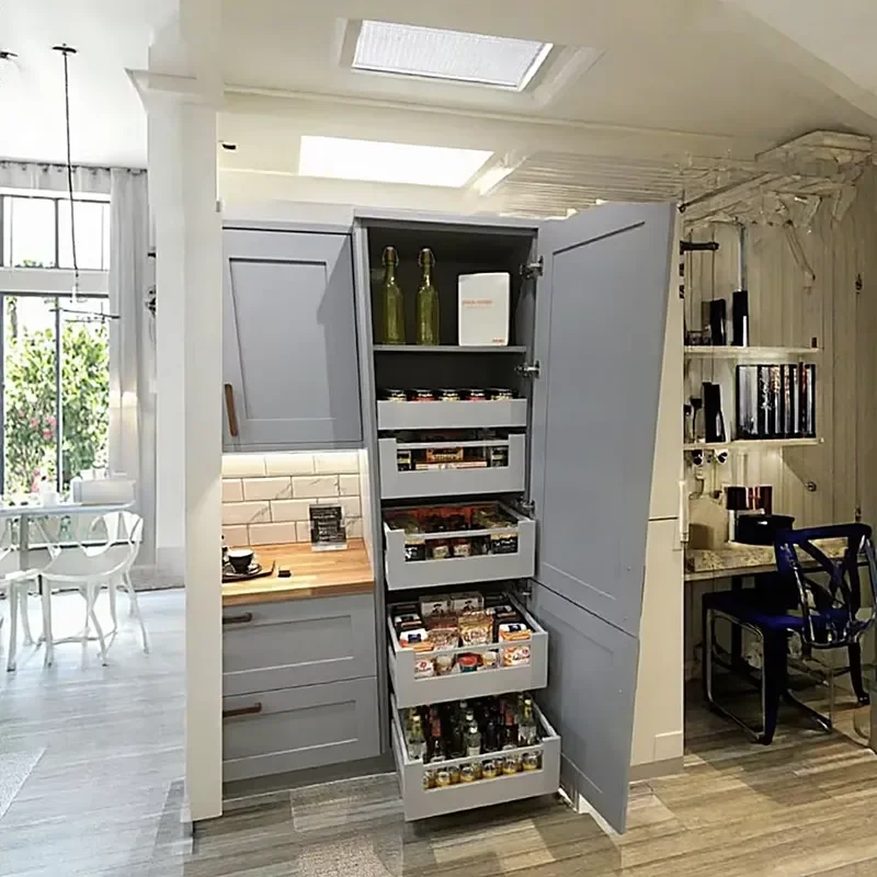 Gray kitchen locker with pull-out metal basket, custom high locker rocking door for villa kitchen projects