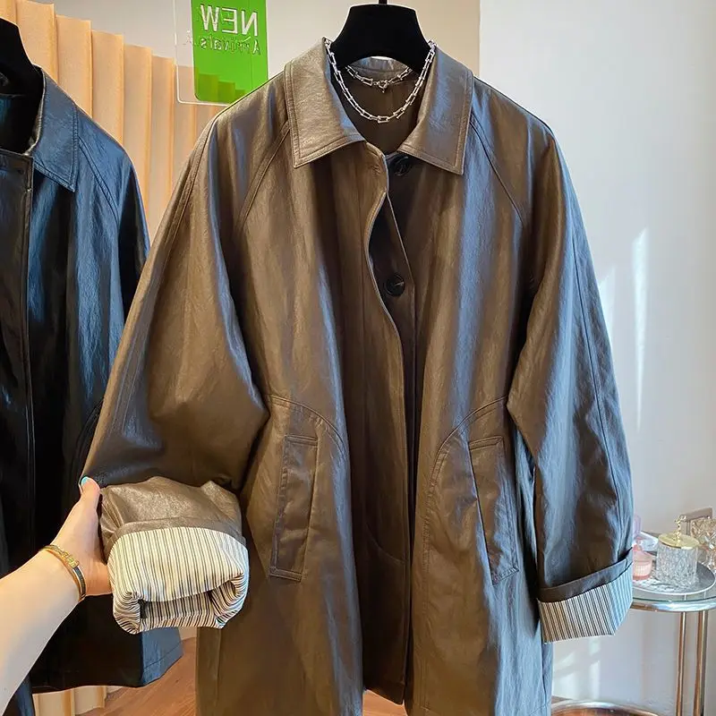 

Coffee medium and long leather jacket women's spring and autumn 2024 new European high-end wide and relaxed trench coat