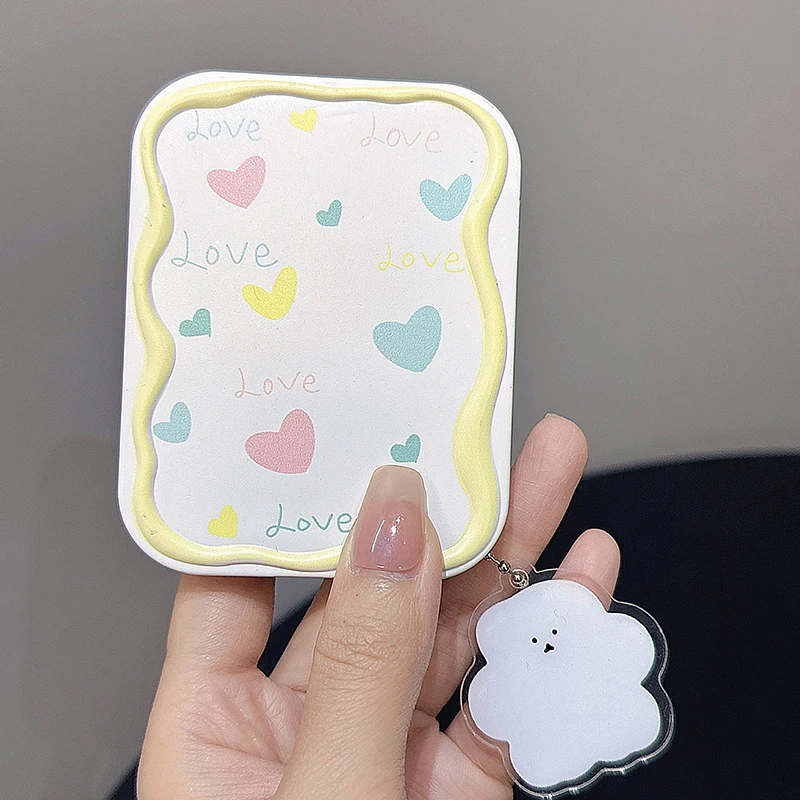 Arco dos desenhos animados amor coração espelho portátil pente conjunto dobrável criatividade estudante dos desenhos animados espelho e pente de cabelo presentes das meninas