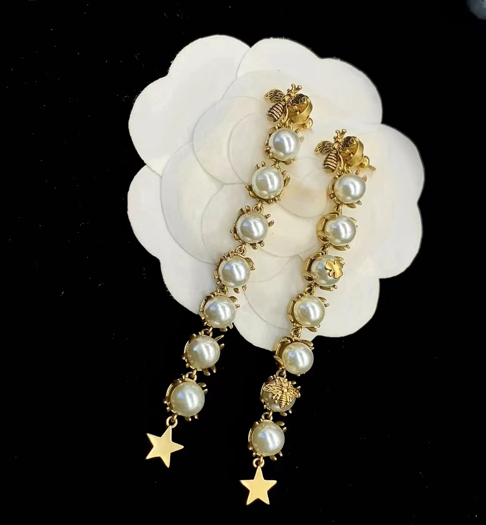 

European and American niche trend personality pearl bee long earrings