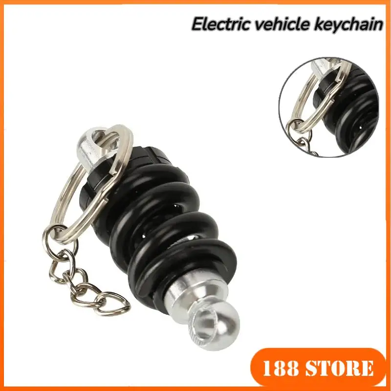 

Aluminum Alloy Shock Absorber Key Ring - Stylish Automotive Front Strut Pendant Suitable for Cars & Scooters