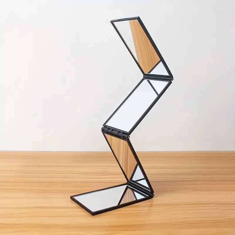 Specchio pieghevole portatile 1PC: 360 °   Palmare a 4 facce, multifunzionale per taglio di capelli e viaggi - Design compatto e leggero