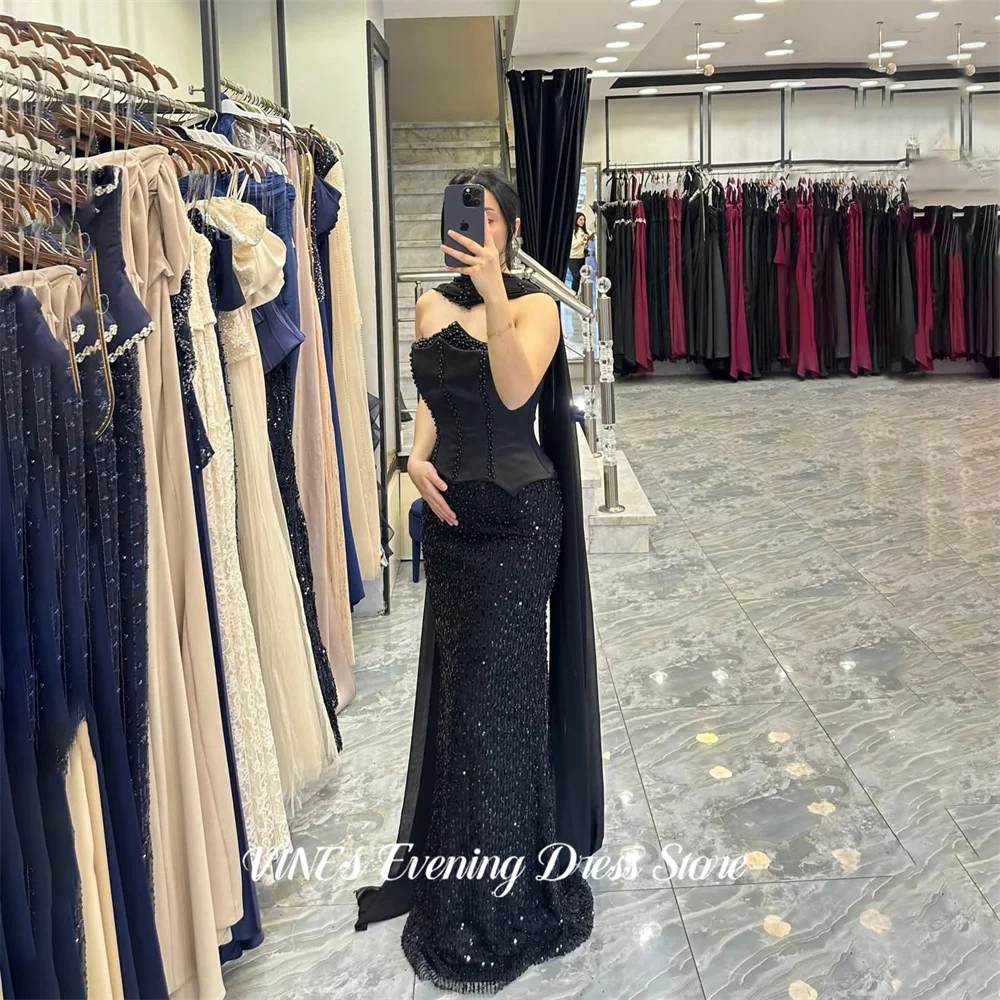 

VINES Black Mermaid Evening Dresses with Beaded Gala Dresses Draped Neck Sash Prom Dresses Sequin Hem Party Dress Customized
