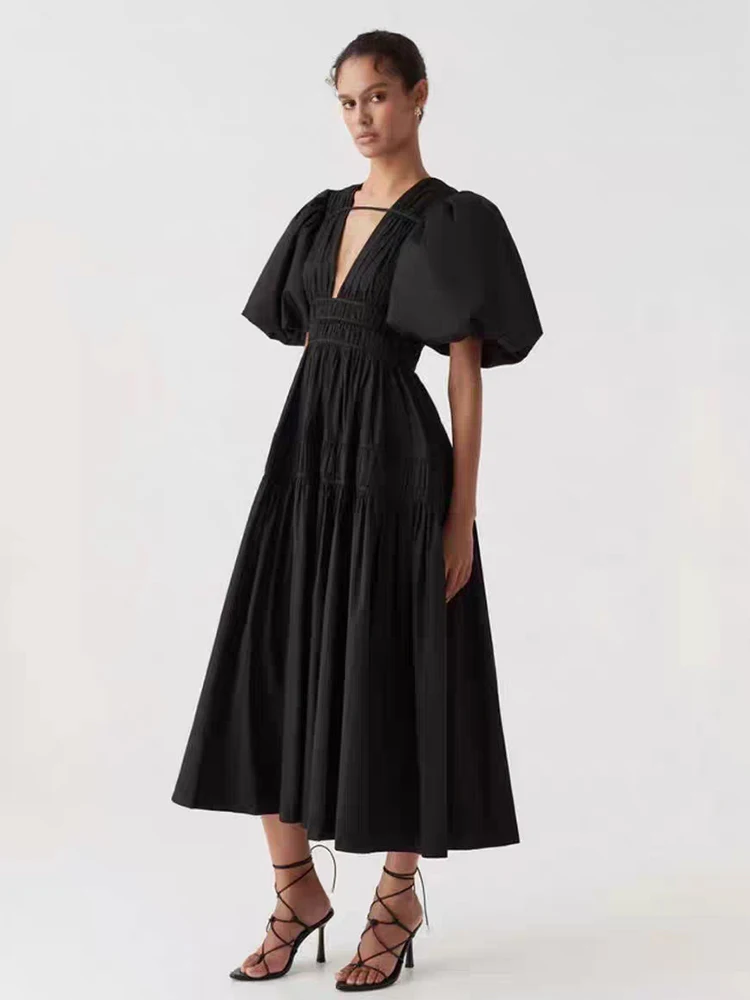 2025 verano mujer sexy escote en V profundo manga de burbuja plisado vestido de cintura alta moda dobladillo suelto falda pommel