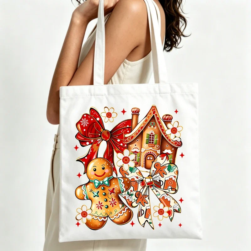 gingerbread house and man graphic canvas tote bag, perfect for holiday shopping and casual winter outings