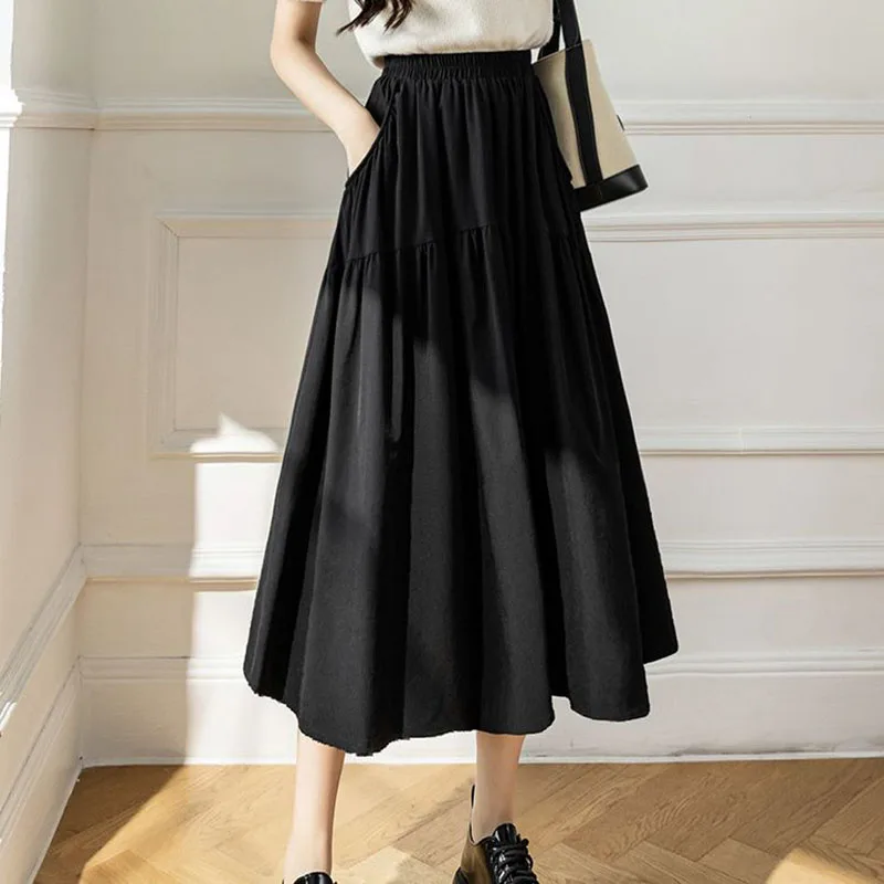 Saia midi branca para mulheres no verão 2025, novo design de cintura alta e emagrecimento, saia casual evasê que cobre os quadris