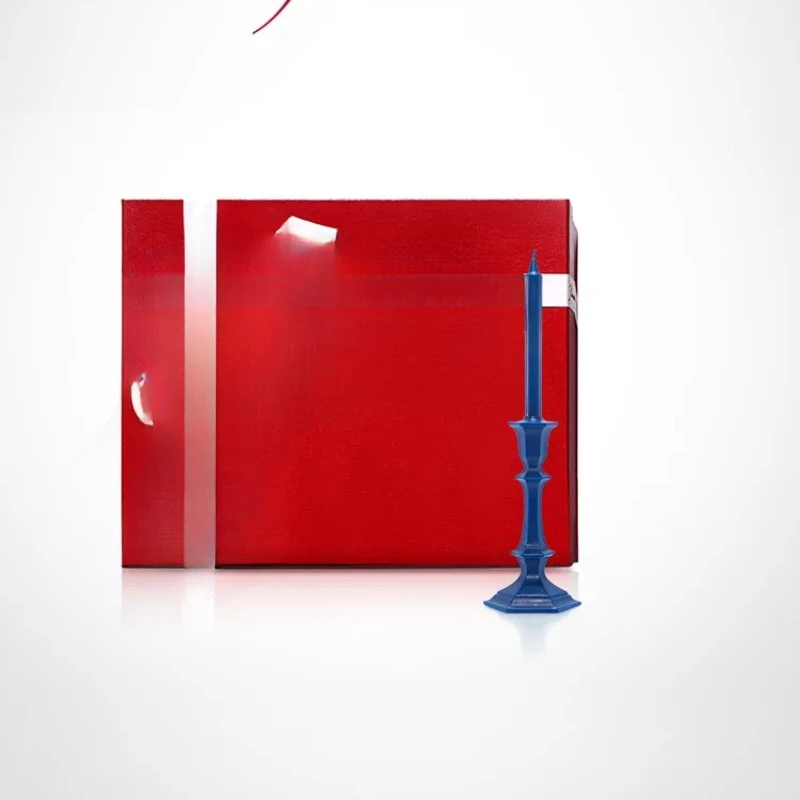 Candlestick candle, red gift box.