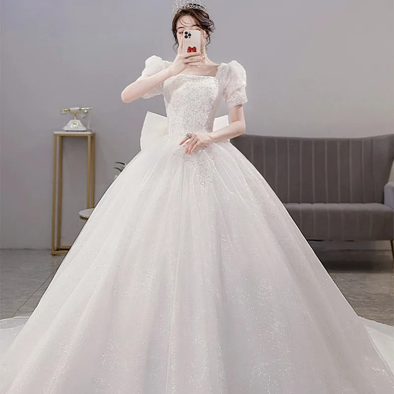 Customized White Ball Gown Wedding Dresses Sequins With Bow Short Sleeve Bridal Gowns Formal Vestido De Noiva robe de mariée