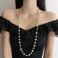 Fashionable Long Necklace Women's Style Saturn Pendant Coffee Color Knitwear Chain Retro Beauty Pearl Stringing Jewelry